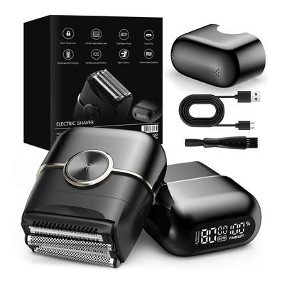男性用の携帯ミニ電気剃り機 4刃磁気浮遊システムと100分作業時間 300mAhバッテリーで動いています